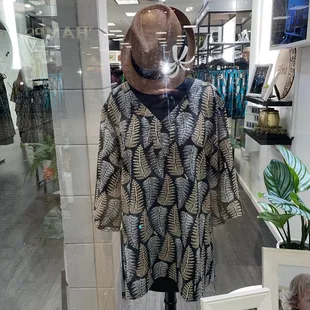 Hat &amp; women's top display.