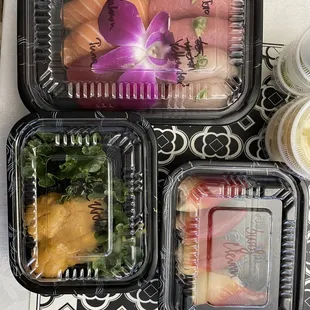 Toro, yellowtail, salmon, tuna, surf clam, and uni sushi