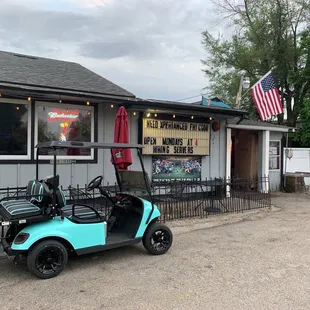a golf cart parked outside