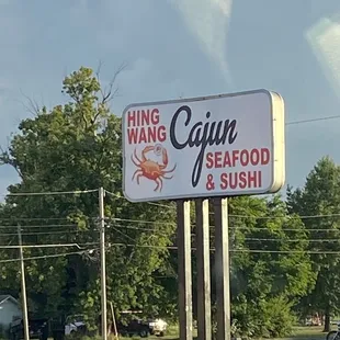a sign for seafood and sushi