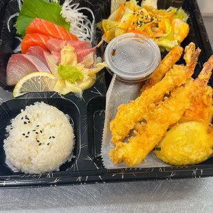 Sashimi bento box with tempura.