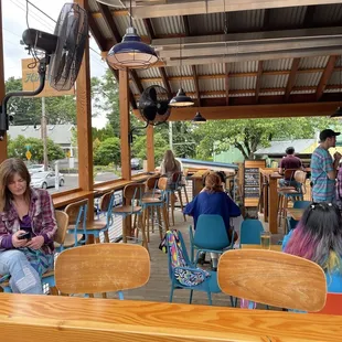 Outdoor covered seating area in front (there is another area in the back)