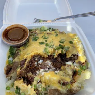 Brisket stuffed baked potato. Total weight was just over two pounds! It&apos;s a meal by itself and it was great!