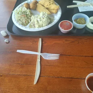 Fried catfish, potato salad,hush puppies and coleslaw