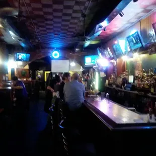 people sitting at the bar