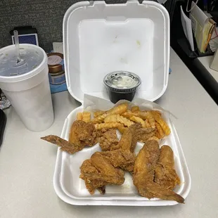 Chicken wings, fries, cole slaw and Diet Coke!