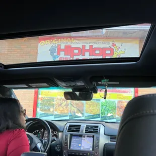a woman driving a car