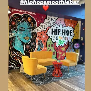 a yellow couch and yellow chairs