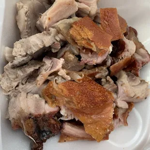 pork in a styrofoam container
