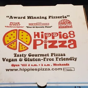 a pizza box with a slice missing