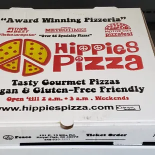 a pizza box with a slice missing