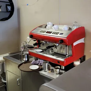 a red coffee machine