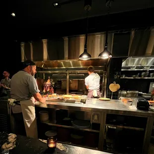 Chef BJ and his crew stoking the wood fired grills.
