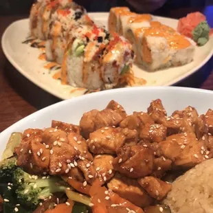 (top) two sushi rolls of the chef&apos;s recommendation; (bottom) hibachi chicken with rice and vegetables