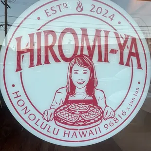 Sign in the window facing Kapahulu Ave
