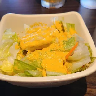 Salad with ginger dressing was tasty.