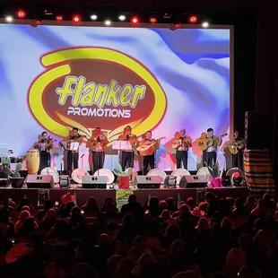 a band performing on stage