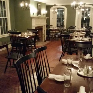 The main dining room with period-correct furnishings and historic appointments.