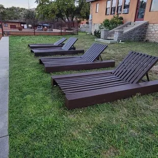 Sun lounges by pool area and Main House