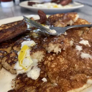 Pick Three: pancakes, eggs over easy, bacon.