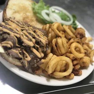 Pork sandwich special with curly fries