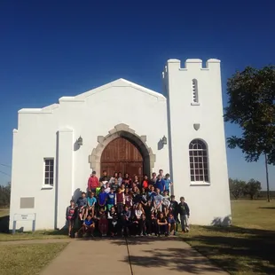 Group Tour of International Students in front of 1944 POW Chapel