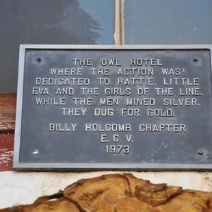 plaque on the outside of the building