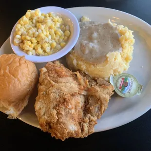 Fried Chicken with Mashed Potatoes and Gravy and Corn.