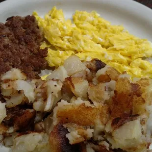 Scrambled eggs, fried potatoes and an awesome sausage patty.
