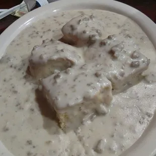 Delicious biscuits and gravy (look at all that gravy - AND sausage)