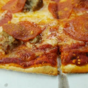 The sausage and pepperoni pizza