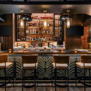 Take a seat at the bar and enjoy a handcrafted cocktail