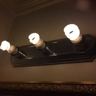 Fancy "historic" lighting fixtures? I think not.