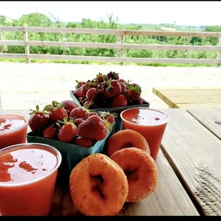 Fresh picked strawberries with their strawberry wine slush is, don't forget the donuts