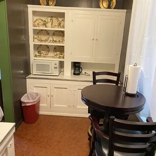 Other end of kitchen. Silverware, coffee, toaster, etc in cabinet