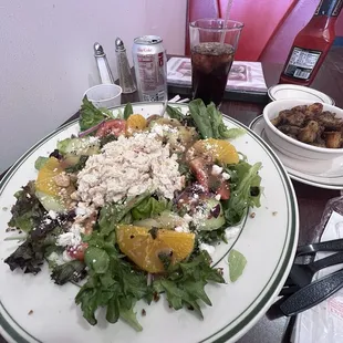 Citrus salad with chicken salad.  Side of potatoes