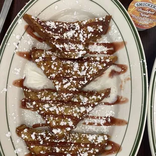 French toast with homemade strawberry sauce.