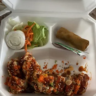 a meal in a styrofoam container