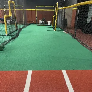 One of our cages with softball machine