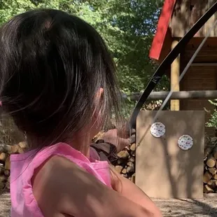 Zoom in...arrow in flight to hit the left plate!!  She's four!  ;). Great starter bow Neil / thanks!!