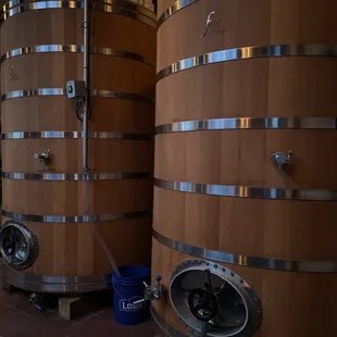 a row of wooden barrels