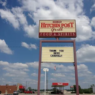 a sign for hitchin post grill