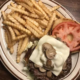 Swiss mushroom burger and fries.