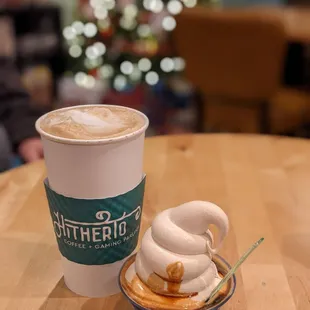 a cup of coffee and a pastry