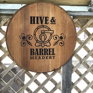 a sign for hive and barrel meadery
