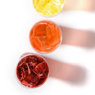  three different colored drinks