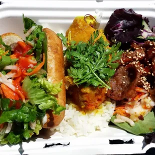 Sampler- bulkogi bahn mi sandwich, curry chicken and spicy pork salad $9