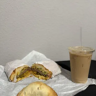 Breakfast Empanada, Rolo Steak hot sandwich, and Iced Hazelnut Latte