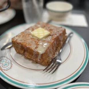 a piece of cake on a plate with a fork