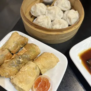 Shanghai soup pork dumplings (Xiao Long Bao) and vegetable bean curd roll